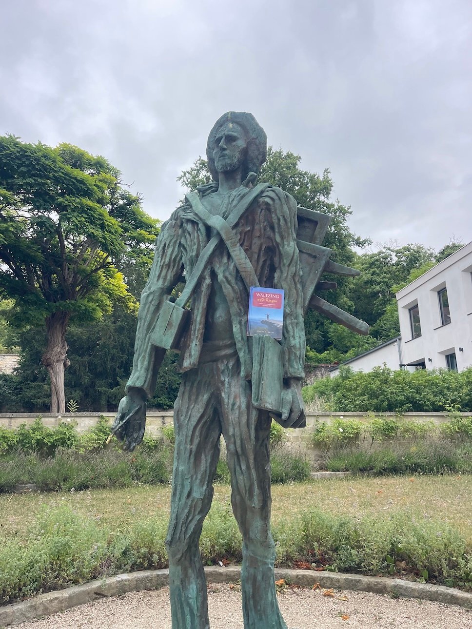 Statue with Waltzing with Wayne book